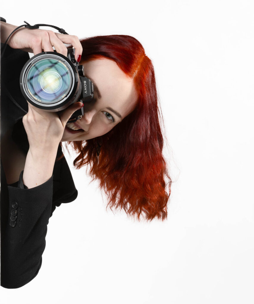 Die Fotografin von Life on Lens fotografiert bei einem Fotoshooting.